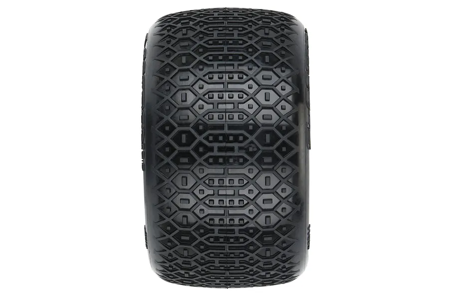 A top-down view of a black Pro-Line 2.2 inch RC stadium truck tyre showing the detailed hexagonal and block tread pattern.