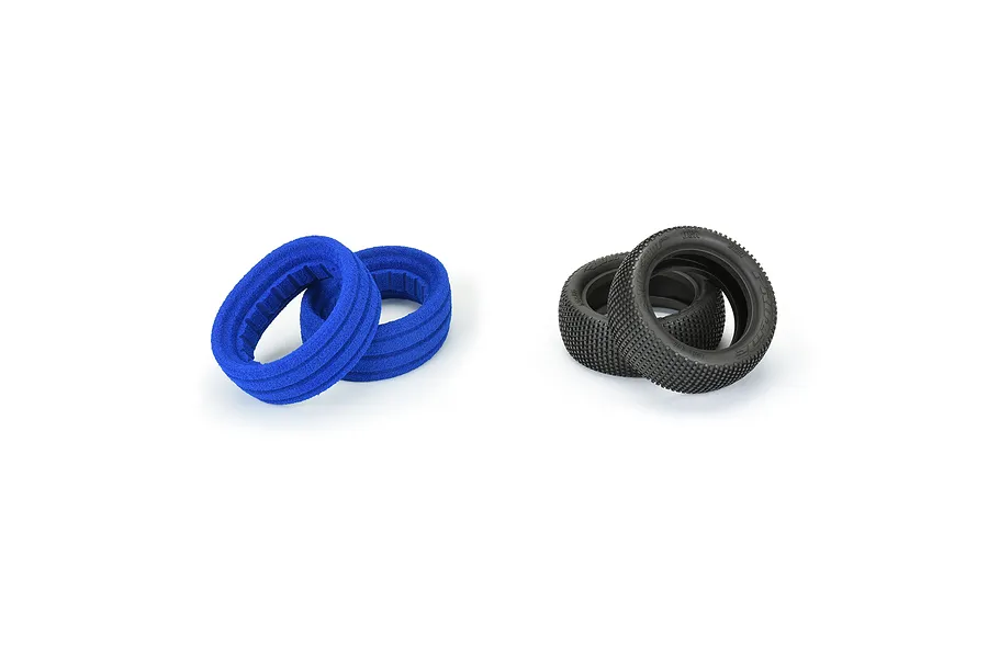 Two black Pro-Line Hole Shot 3.0 RC buggy tyres and two blue foam inserts on a white background.