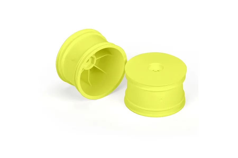 Two bright yellow Pro-Line 2.2 inch RC buggy dish wheels shown from different angles against a white background.