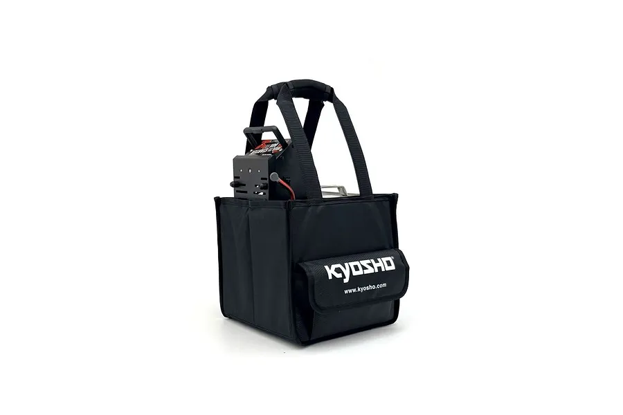 A black Kyosho branded pit bag containing a starter box, isolated on a white background.