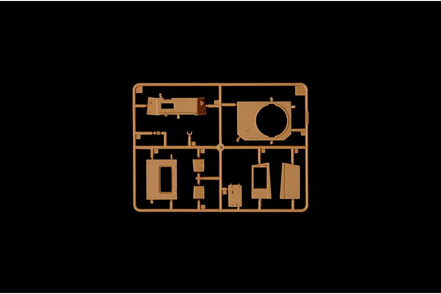 A tan plastic sprue containing various unpainted model tank parts for the Italeri 1/35 Carro Armato L6/40 kit.