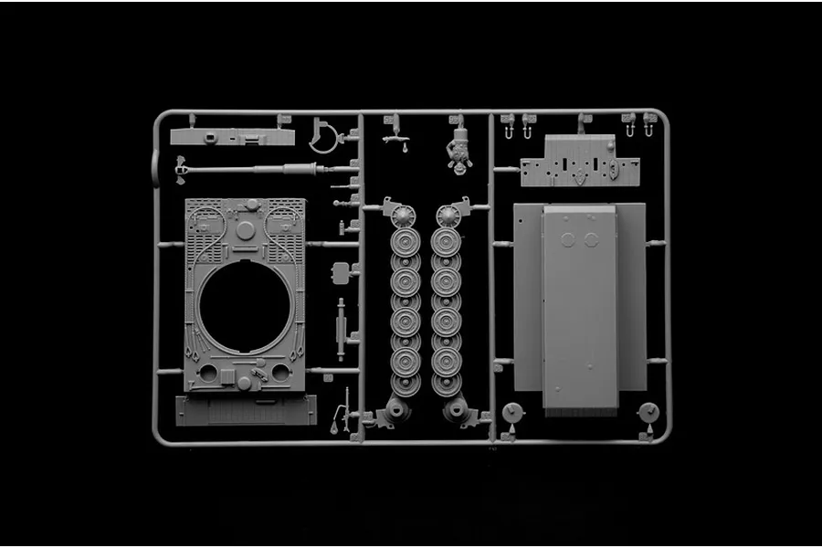 A grey plastic sprue containing various parts for an Italeri 1/56 scale Tiger I tank model kit, including hull, turret, and road wheel components.