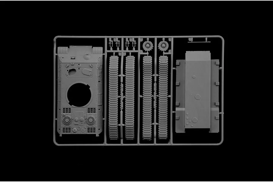 A grey plastic sprue containing parts for a 1/56 scale model tank, including the hull, turret, and track sections, isolated on a black background.