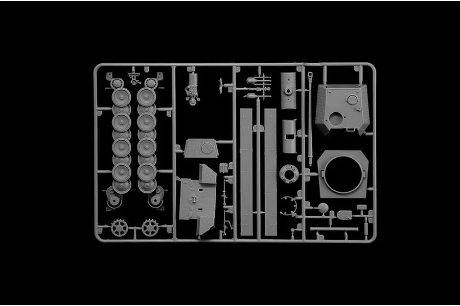 A grey plastic sprue containing various unpainted model tank parts for an Italeri 1/56 Panther tank kit, set against a solid black background.