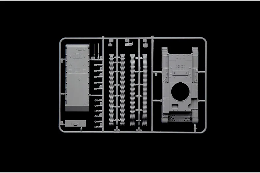 A grey plastic sprue containing parts for an Italeri 1/56 scale Cromwell Mk.IV tank model kit, including the hull and track sections.
