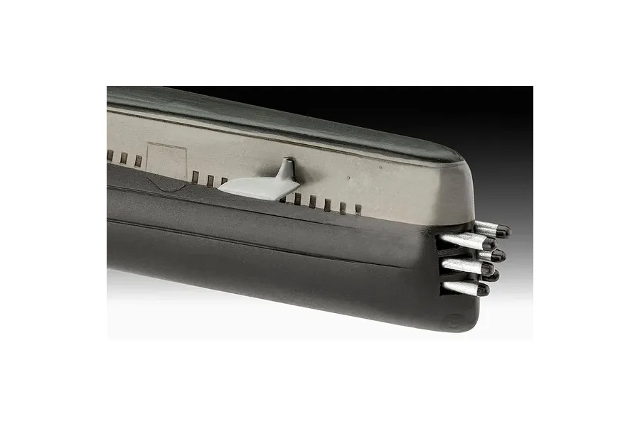 Close-up of the stern section of a plastic model submarine, showing the hull, a small fin, and propeller shafts.