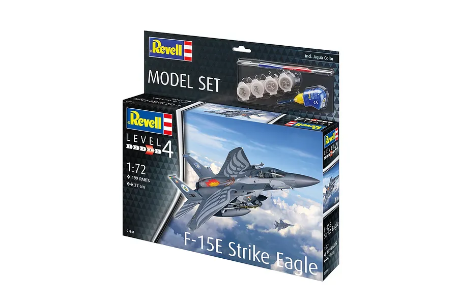 Revell 1/72 scale F-15E Strike Eagle model kit box featuring a painted aircraft in flight, including paint pots, glue, and a brush.