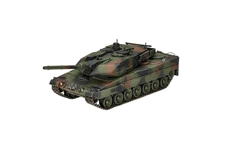 A high-angle studio shot of a fully assembled and painted 1/35 scale Leopard 2 A6A2 tank model featuring a camouflage pattern.