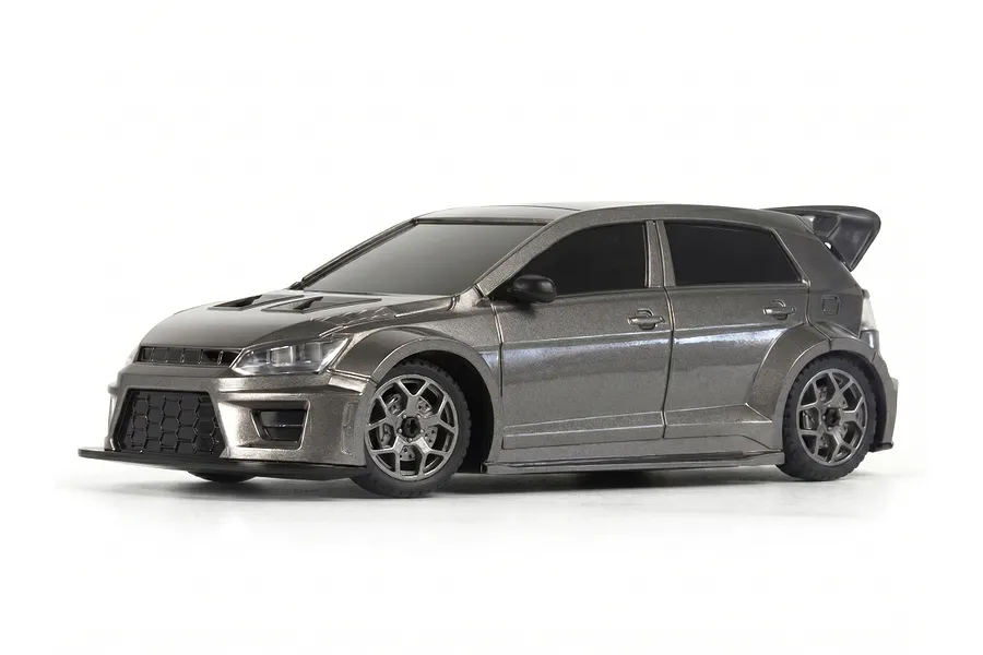 A grey BlackZon Myte 1/43 scale RC rally car viewed from a front three-quarter angle against a white background.