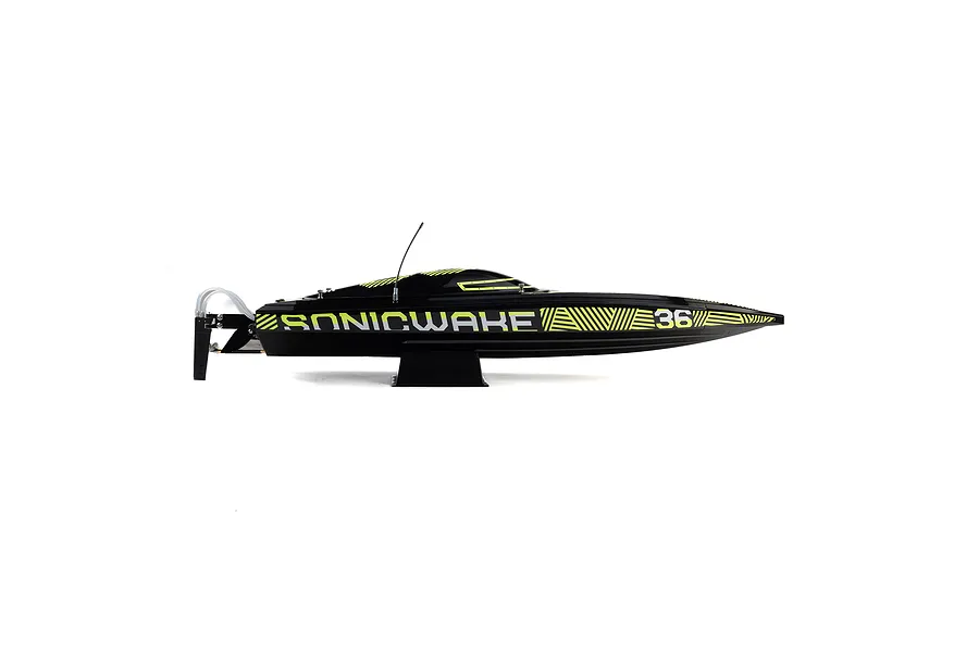 Side profile of a black Pro Boat Sonicwake V3 36 inch RC speed boat with yellow graphics on a white background.