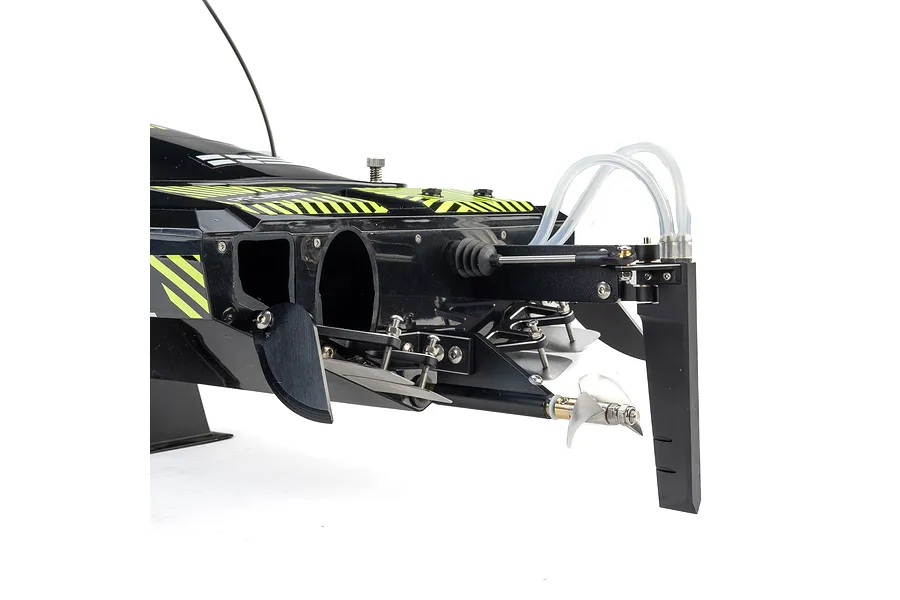 Close-up of the stern of a Pro Boat Sonicwake V3 RC boat, showing the rudder, propeller, trim tabs, and cooling tubes against a white background.