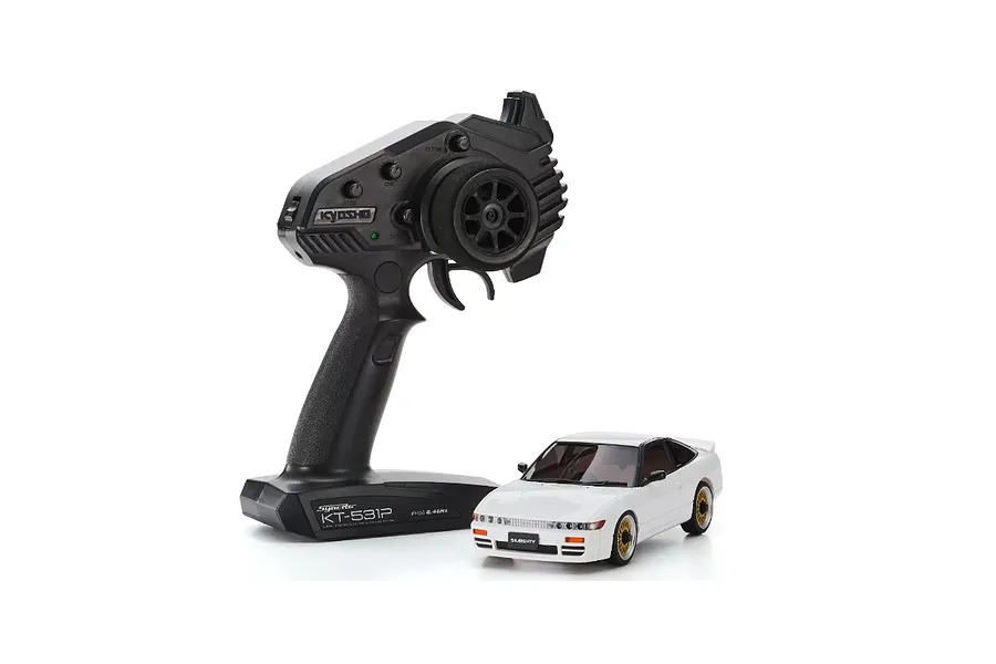 Kyosho Mini-Z MA-020 Nissan Sileighty RC drift car in white, displayed next to its black Syncro KT-531P transmitter.