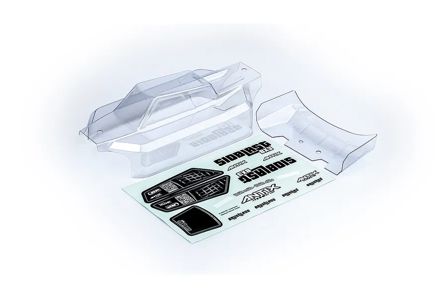 Clear polycarbonate RC buggy body shell, rear wing, and decal sheet for LRP Antix S10 Blast BX3 on a white background.