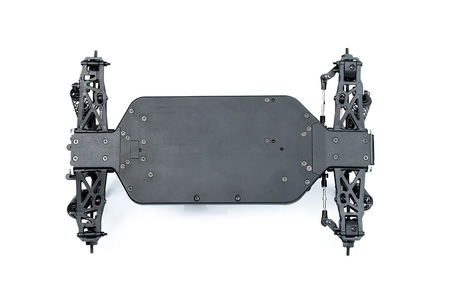Top-down view of an LRP S10 Blast RC buggy chassis showing the main tub, suspension arms, and shock absorbers on a white background.