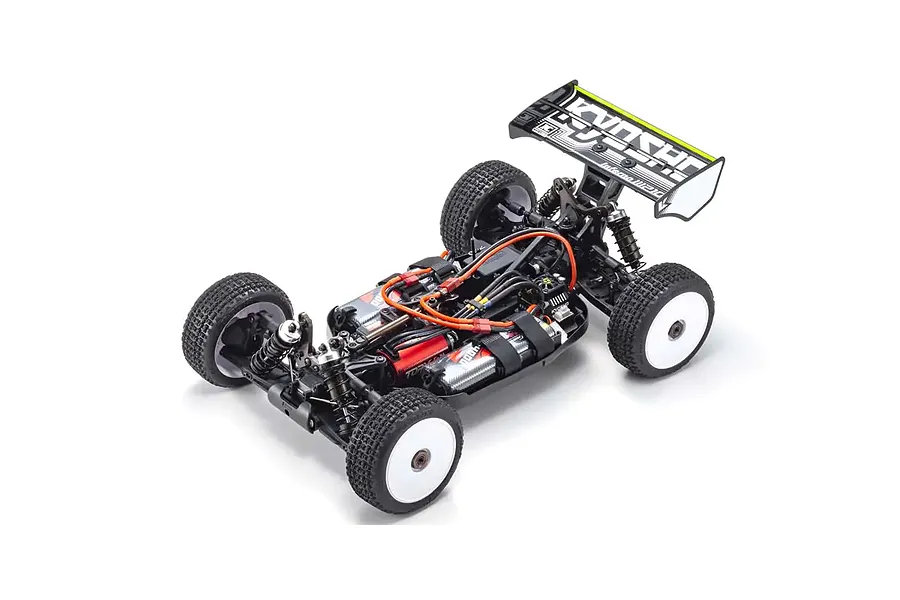 High-angle studio shot of the Kyosho Inferno MP10e 1/8 scale electric RC buggy chassis without body shell, showing internal components and white wheels.