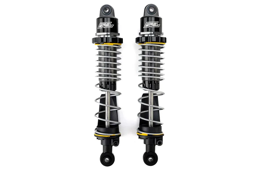 Two Pro-Line PowerStroke black aluminium RC shock absorbers side by side on a white background.
