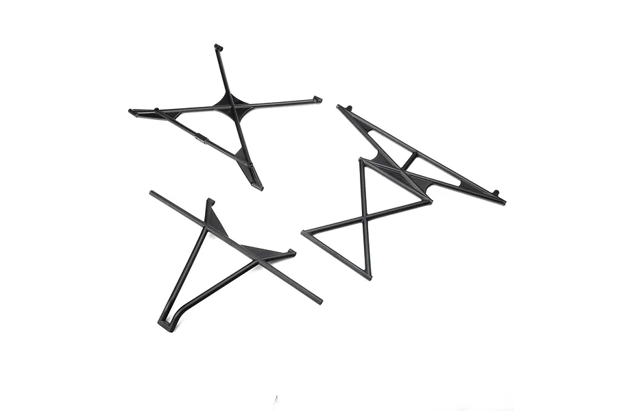 Three black plastic RC car cage support components arranged on a white background.