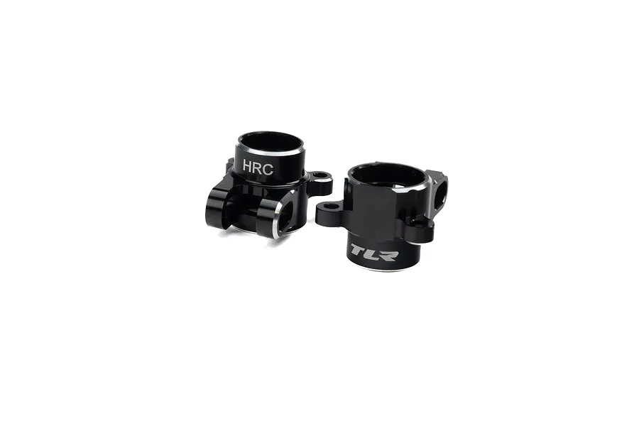 A pair of black anodized aluminium rear hubs for an RC car, featuring TLR and HRC branding, set against a plain white background.