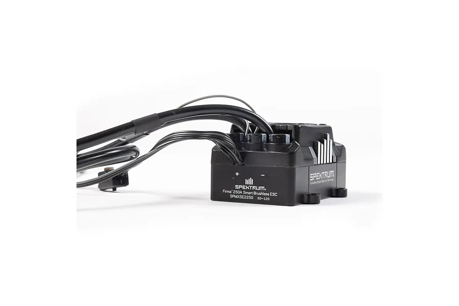 Spektrum Firma 250A Smart Brushless ESC unit with attached black wiring and connectors on a white background.