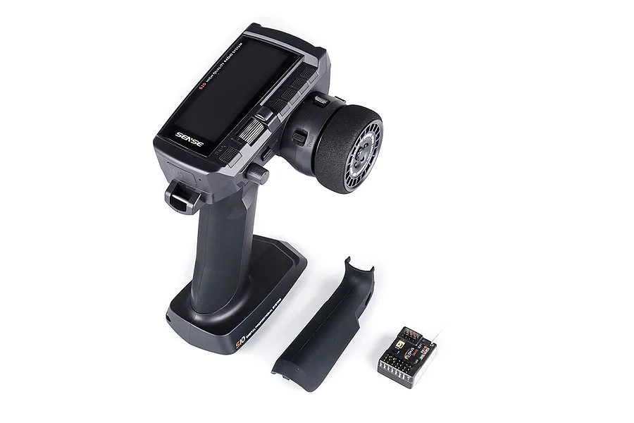 Sense Innovations S10 10-channel RC transmitter with steering wheel, detachable grip, and S10RX-10 receiver on a white background.