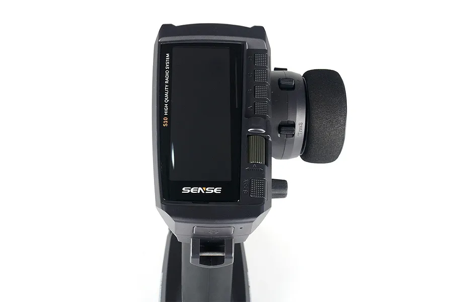 Sense Innovations S10 10-channel RC transmitter shown from a top-down perspective against a white background.