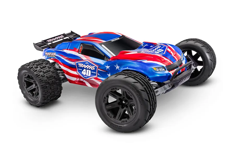 A Traxxas Rustler 40th Anniversary edition RC stadium truck with a red, white, and blue patriotic paint scheme on a white background.