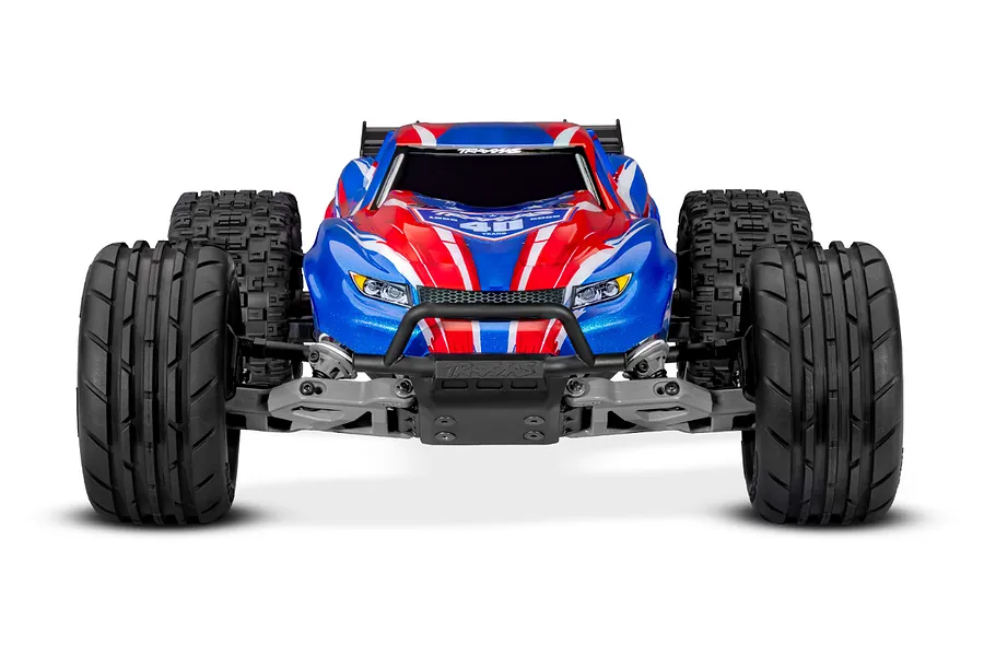 Front view of a Traxxas Rustler RC stadium truck with a red, white, and blue 40th anniversary body shell on a white background.