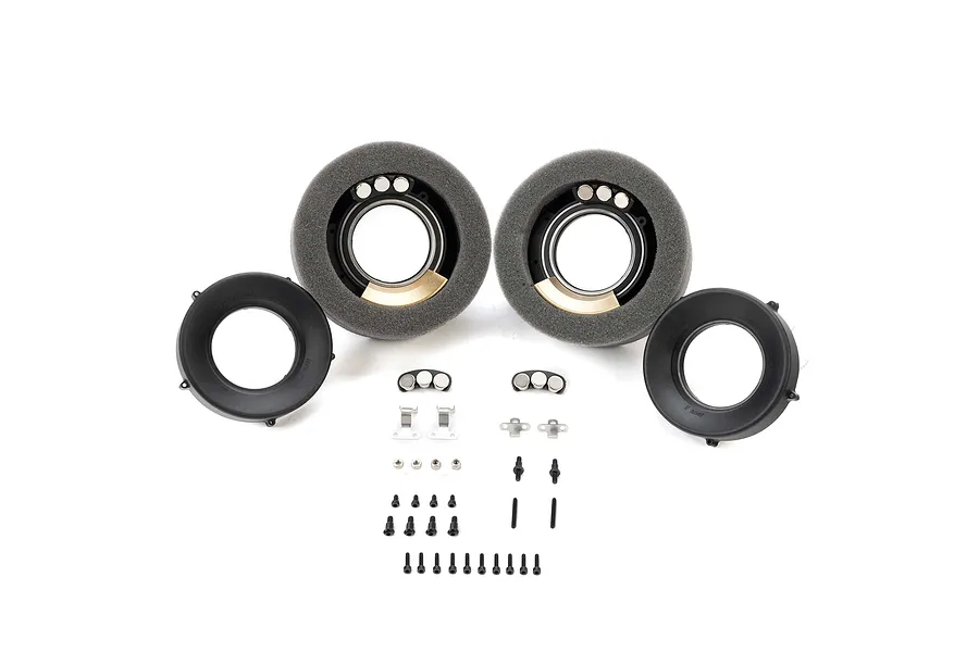 Pro-Line 1.9 inch Rock-Tek tyre weight system components including foam inserts, brass weights, and mounting hardware on a white background.