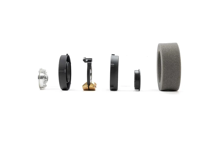 An exploded view of the Pro-Line 1.9 inch Rock-Tek tyre weight set components arranged in a line against a white background.