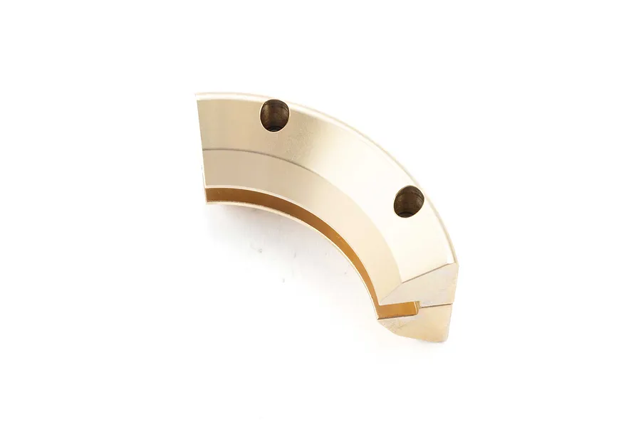 A single curved brass wheel weight for an RC crawler, featuring two mounting holes on a white background.