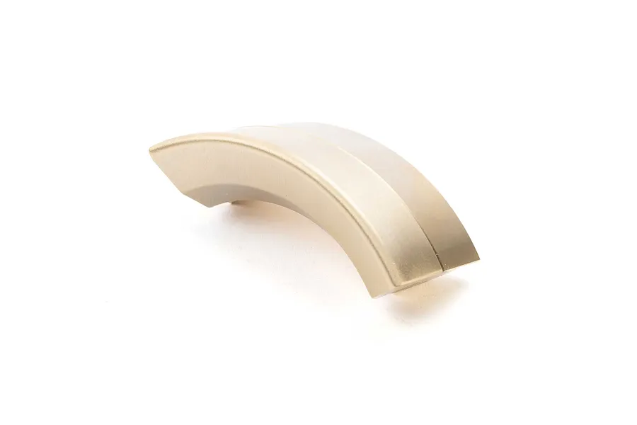 A single curved brass weight component for RC crawler wheels, shown against a white background.