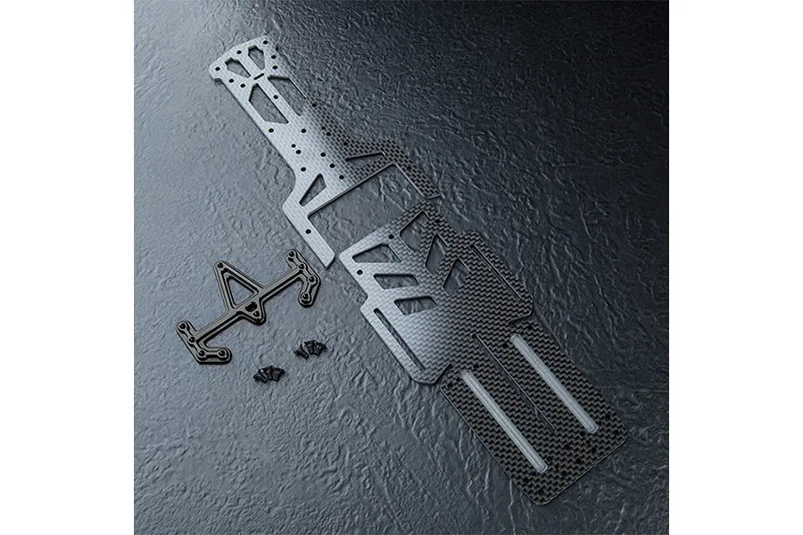 MST carbon fiber RC chassis lower deck components and mounting hardware on a textured black surface.