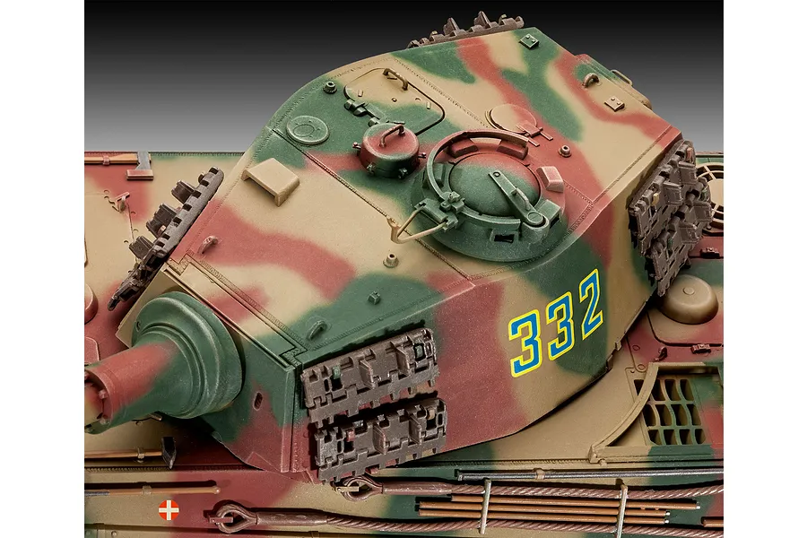 Close-up of a painted Tiger II tank model showing the turret with camouflage paint and the number 332 on the side.