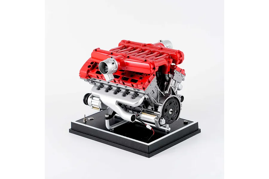 A detailed Teching DM109 V12 engine model kit displayed on a black base against a white background.
