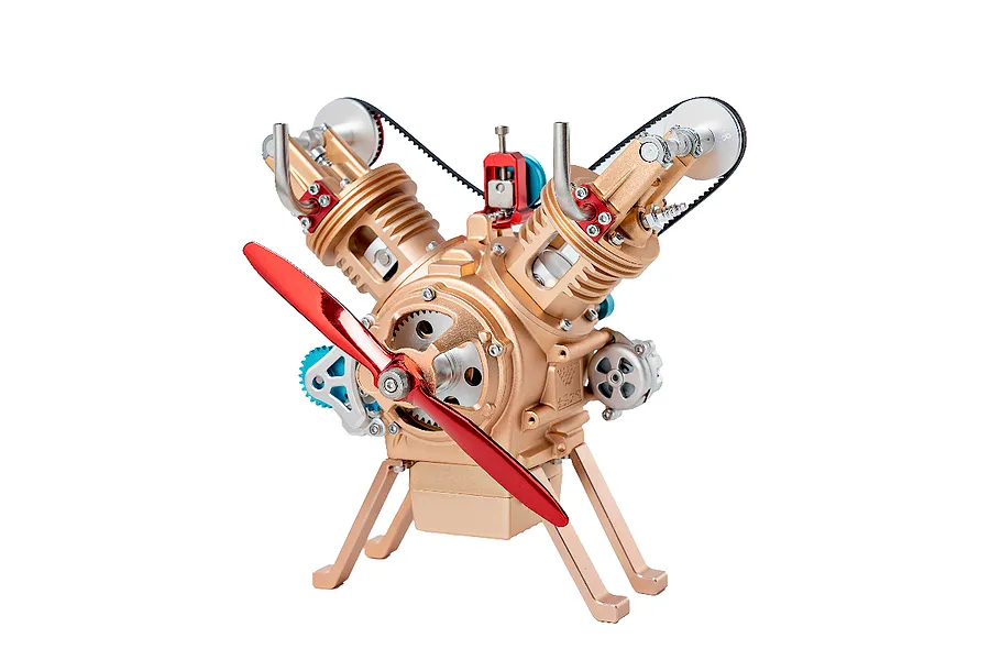A detailed metal V-twin engine model kit by Teching with a prominent red propeller, gold engine block, and blue accent gears against a white background.