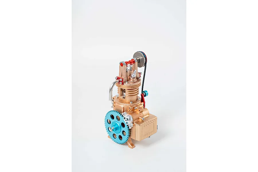 A Teching DM117 single cylinder engine model kit featuring gold, blue, and red metallic components against a white background.