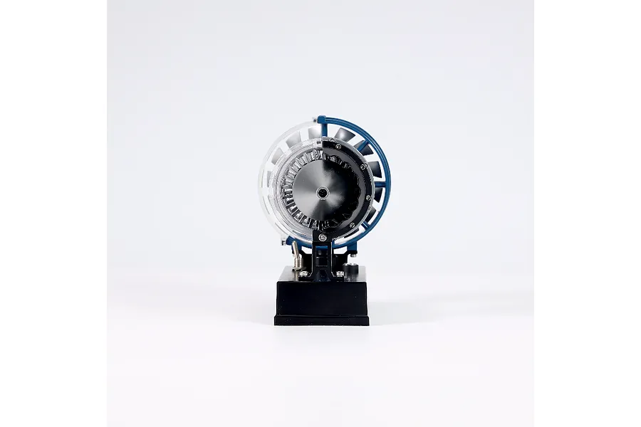 Front view of the Teching DM122 mini turbofan engine model kit showing the fan blades and internal structure on a black base.