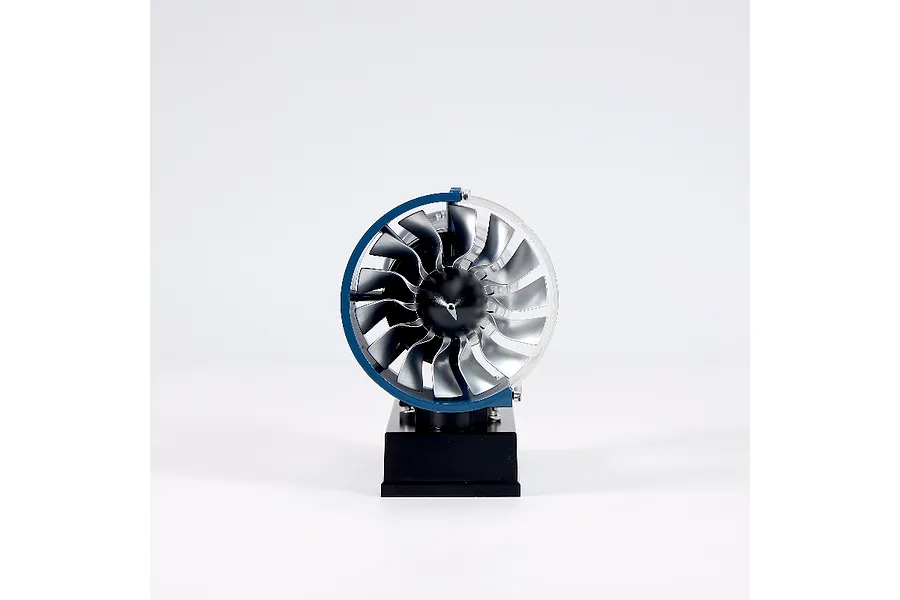 Front view of the Teching DM122 mini turbofan engine model kit showing the fan blades and blue casing on a black display stand.