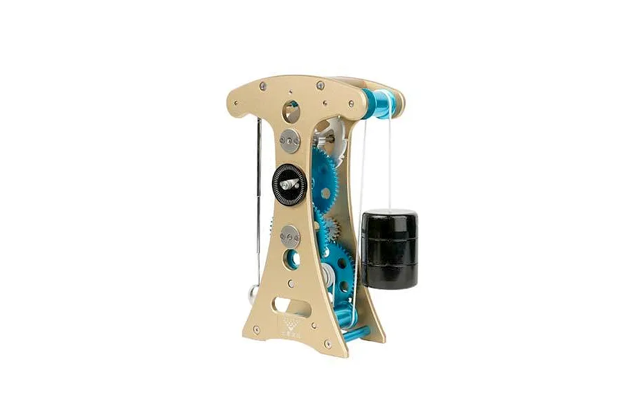 A studio shot of the Teching DM335 Galileo Pendulum Clock metal model kit featuring a gold frame, blue gears, and a black hanging weight.