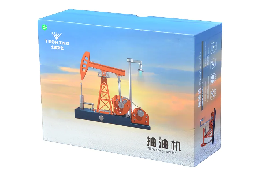 A Teching DM601 oil pumping machine model kit box featuring an orange and silver pump jack model on a sunset background.