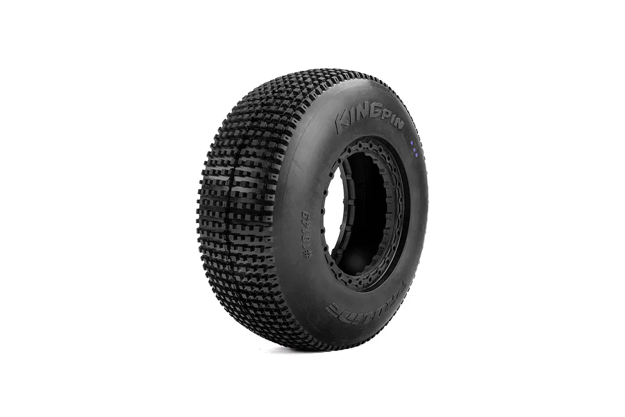 A single Pro-Line King Pin off-road RC tyre featuring a dense square-pin tread pattern and embossed branding on the sidewall.