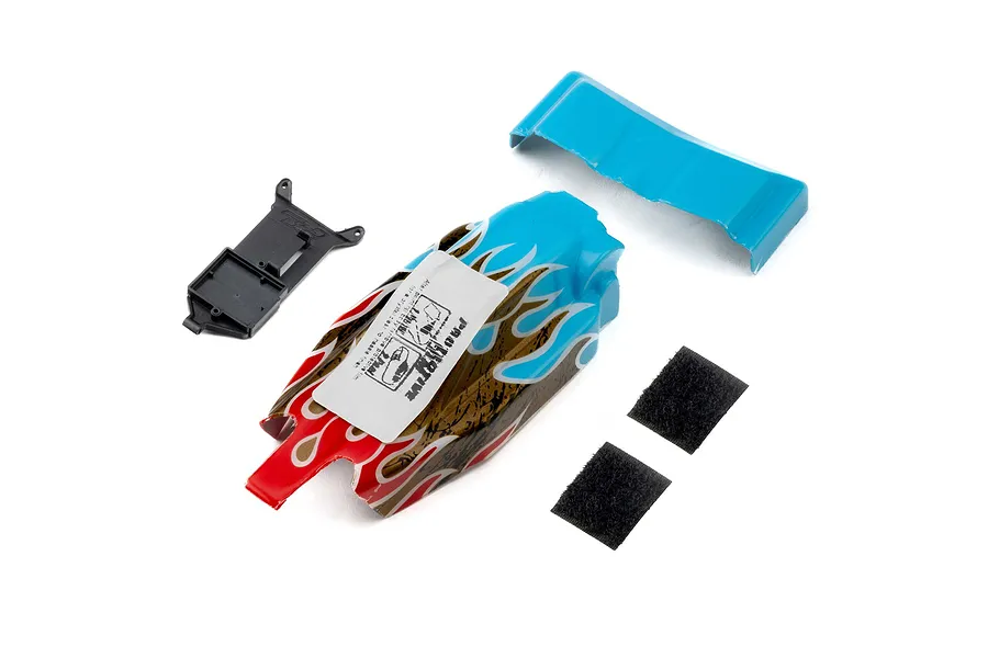 Pro-Line 1/28 Micro-B painted body shell with flame design, blue wing, black ESC relocator mount, and two small adhesive hook-and-loop squares.