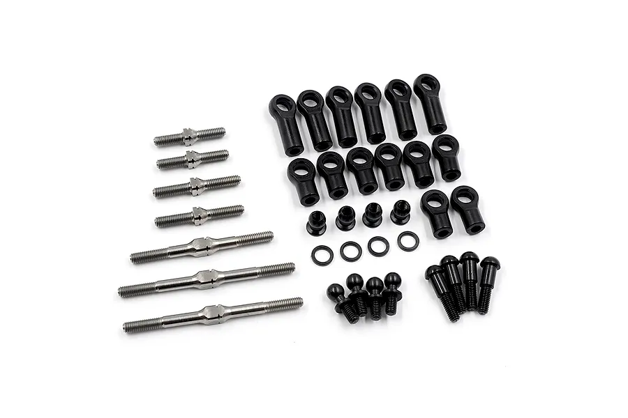A set of Yeah Racing titanium turnbuckles, black plastic rod ends, metal ball studs, and small washers arranged on a white background.