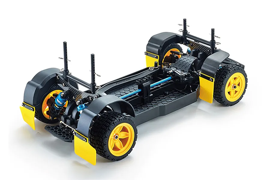 A 1/10 scale RC rally car chassis roller with yellow wheels, black mudflaps, and blue shock absorbers on a white background.