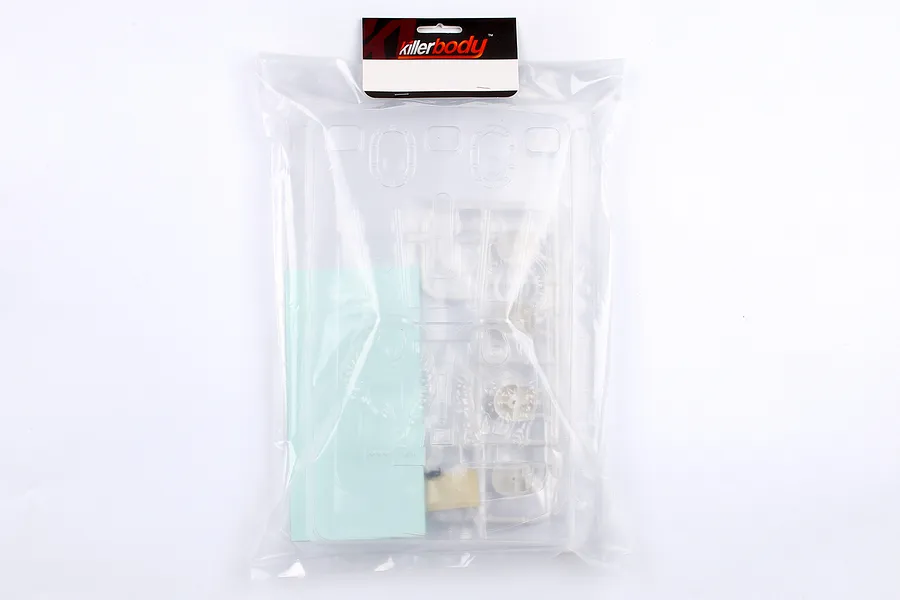Killerbody Lancia Stratos Gr.4 unpainted cockpit set in clear plastic packaging with a header card.