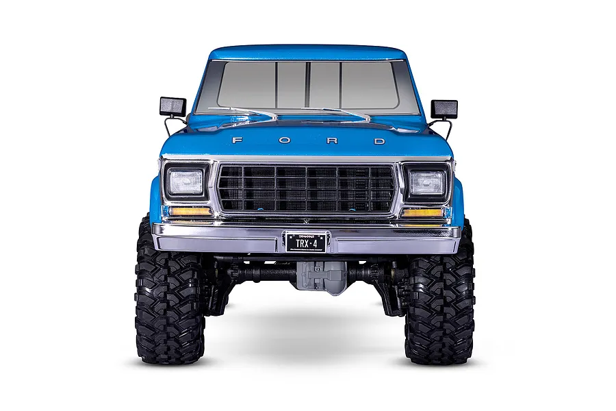 Front view of a blue Traxxas TRX-4 1979 Ford F-150 Ranger XLT RC rock crawler on a white background.