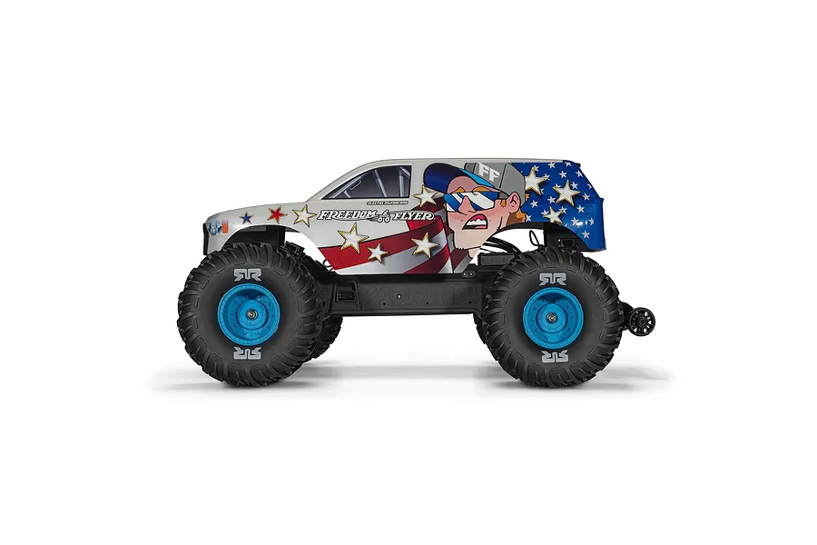 Side profile of the ARRMA Freedom Flyer RC monster truck featuring a patriotic American flag design, stars, and a cartoon character graphic on a white background.