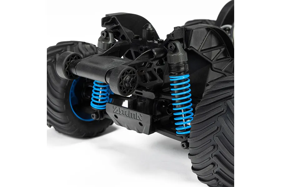 Close-up of the rear suspension and wheelie bar on an ARRMA Grom RC monster truck, featuring bright blue coil springs and black plastic chassis components.