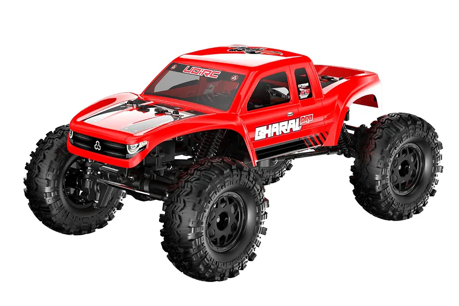 A studio shot of the UDI Bharal Pro 1/18 scale RC rock crawler in red, featuring large black off-road tires and a detailed truck body.