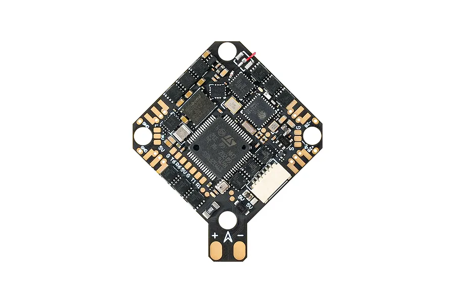 Top view of a black BetaFPV STM32F405 flight controller circuit board with gold solder pads and various electronic components.